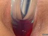 Brunette juicy milf stuffing her cunt with a toy